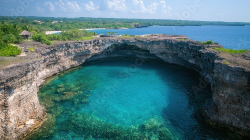 Breathtaking Aerial View of Pristine Coastal Enclave with Clear Blue Water and Green Landscape