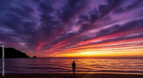 Dramatic Sunset Seascape Solitary Figure on Beach Vibrant Colors