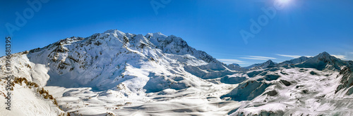 beautiful view on snowy mountain range and ski slope in the French alps in Ta...