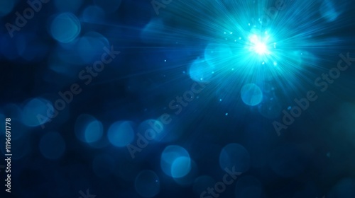 Glittering blue starburst in a bokeh effect background photo