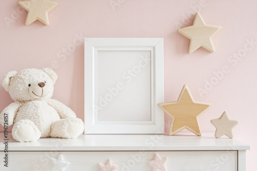 Blank poster mockup in wooden frame, teddy bear and decorative wooden stars on dresser in pink nursery