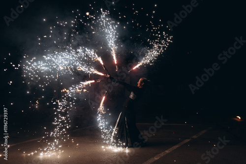Tableau sur toile fireshow artist woman dancing, young caucasian beautiful sportive woman makes pe