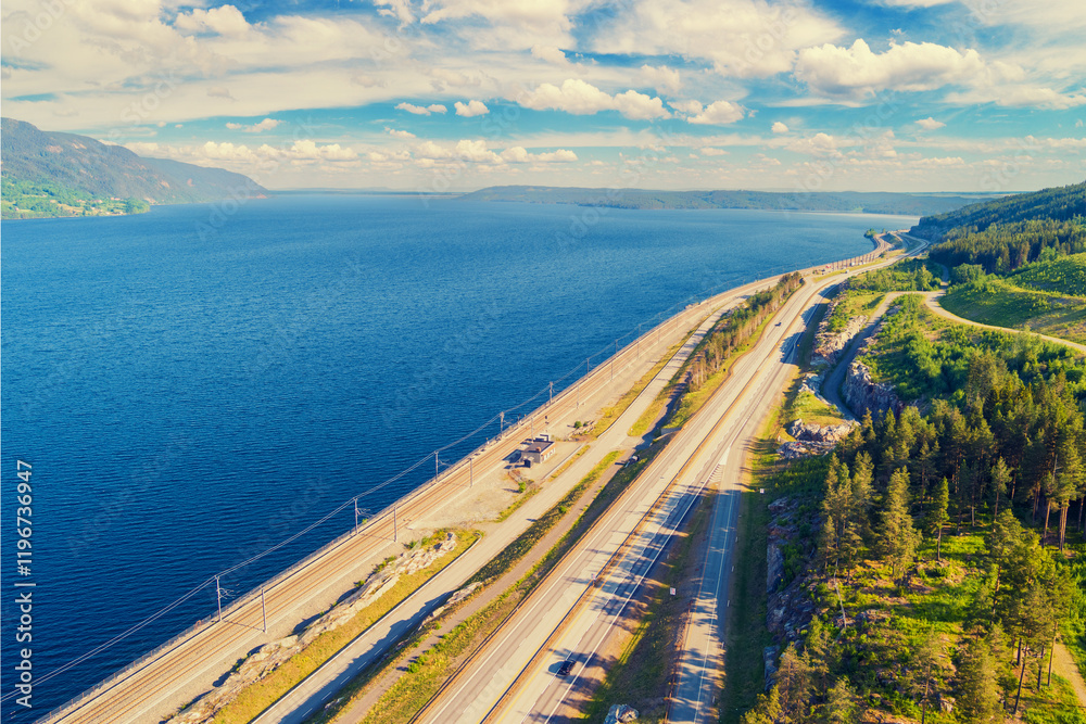 Aerial view of the beautiful Lake Mjosa and the highway. Norway