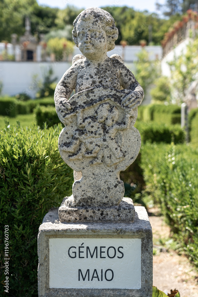 Obraz premium Stone statue depicting the twins sign belonging to the episcopal garden of the city of Castelo Branco-Portugal.