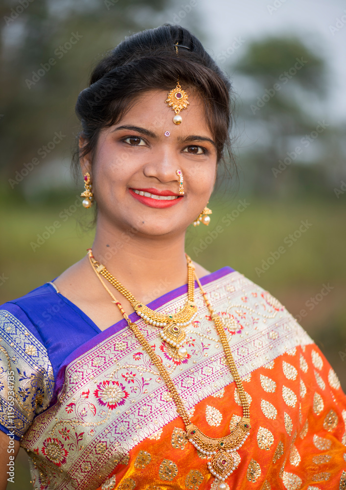Beautiful Indian bride in traditional wedding dress at outdoor. Beautiful Indian bride in traditional wedding dress at outdoor.
