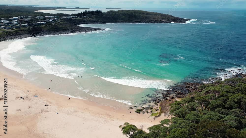 A picturesque Australian beach adorned with soft golden sands and vibrant coastal vegetation, set against a charming suburban backdrop. Experience the perfect blend of nature and tranquility! A picturesque Australian beach adorned with soft golden sands and vibrant coastal vegetation, set against a charming suburban backdrop. Experience the perfect blend of nature and tranquility!