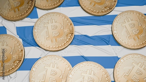 Several bitcoins are laid out on the flag of Greece photo