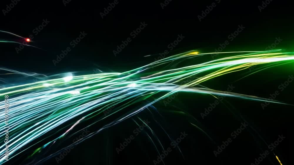 Light trails forming on black background