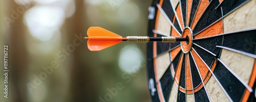 A close-up of a dart embedded in a colorful dartboard, set against a blurred natural background, emphasizing precision and focus.