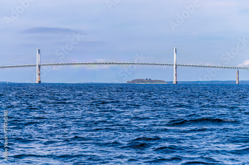 A view towards the center of the Newport bridge in Narragansett bay at Newport, USA in the fall
 photo