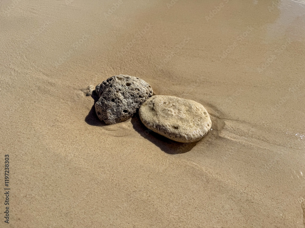 Grand Cayman, Cayman Islands - January 1, 2025: Small rocks along the water of seven mile beach in Grand Cayman
Grand Cayman, Cayman Islands - January 1, 2025: Small rocks along the water of seven mile beach in Grand Cayman