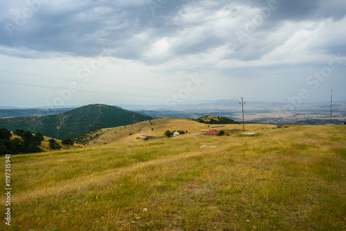 View from mountains across valley to south east with city of Stip on center horizon. Stip, Macedonia   photo