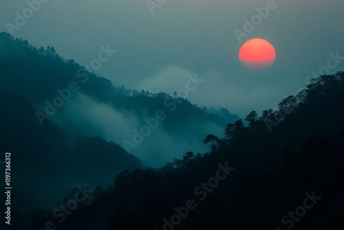 Sunset over rugged mountain landscape with vibrant sky and rocky terrain