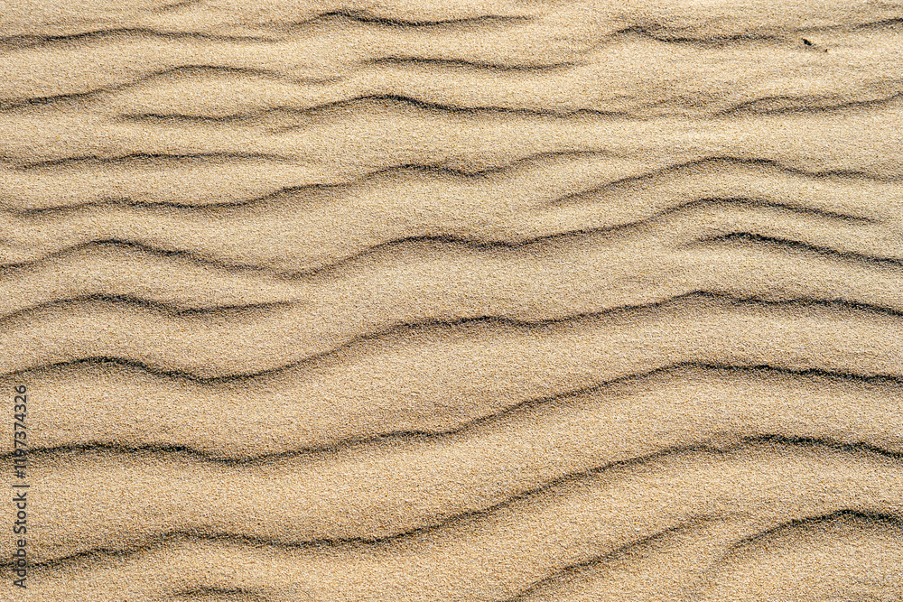 Sand am Strand von Rota in Spanien