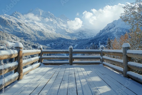 Snowy mountain view from a wooden observation deck in a winter landscape with...