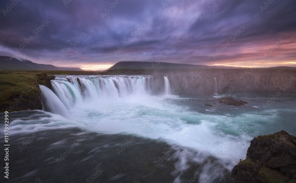 Fototapeta premium Majestic Waterfall of the Gods in Iceland at Dusk Revealing Stunning Natural Beauty