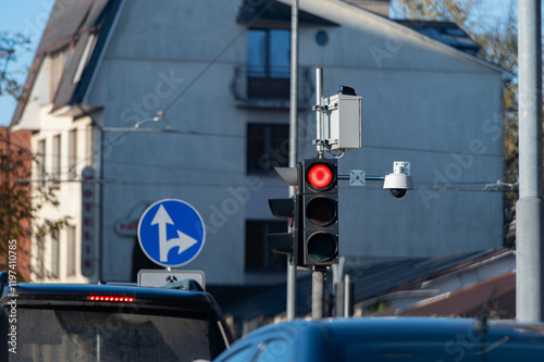 Red traffic light in the city street