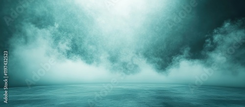 Misty atmospheric background with soft light illuminating low clouds and a calm water surface Copy Space