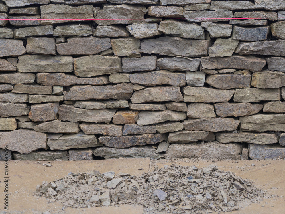 Fototapeta premium Dry stone wall building