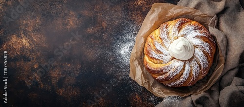 Custard-filled bread bun topped with quark cream, placed on textured dark background with empty space for text and vintage effects. photo