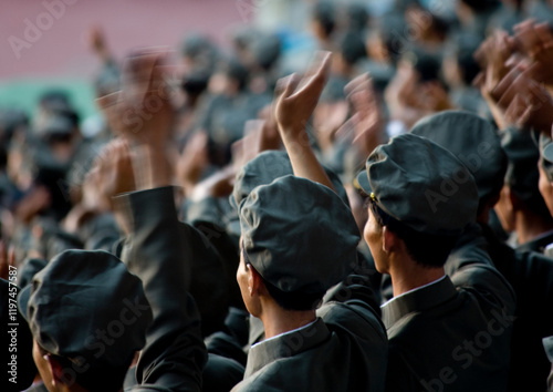 North Korean soldiers watching the Arirang mass games in may day stadium, Pyongan Province, Pyongyang, North Korea photo