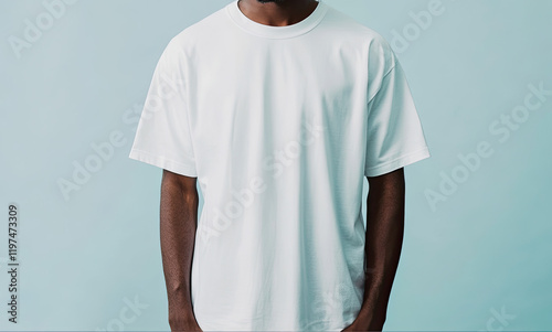 African American Model Wearing White Oversized Tee on Blue Backdrop photo