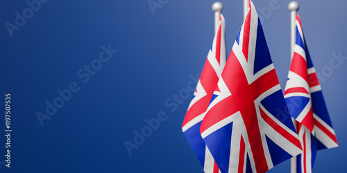 Fotografie Flags of the United Kingdom in front of  a blue background