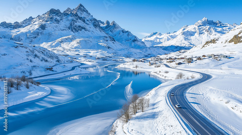 Aerial View of Snowy Mountain Roads Winding Through Majestic Winter Landscapes