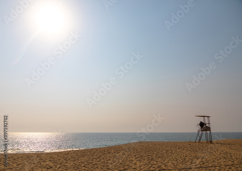 Lifeguard chair at beach against sky, Luanda Province, Luanda, Angola photo