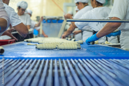 Proces of making cake and sweet pastry. It is made from rolled dough, wrapped around a cylinder,  Pastries Vinica Macedonia photo