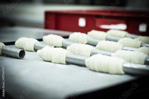  Traditional cake and sweet pastry. It is made from rolled dough, wrapped around a cylinder, Pastries Factory Vinica, Macedonia
 photo