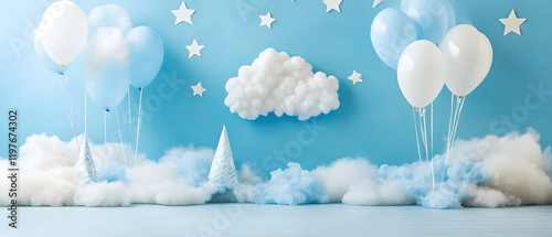 First birthday celebration setup with balloons, stars, and fluffy clouds on a soft blue background  -