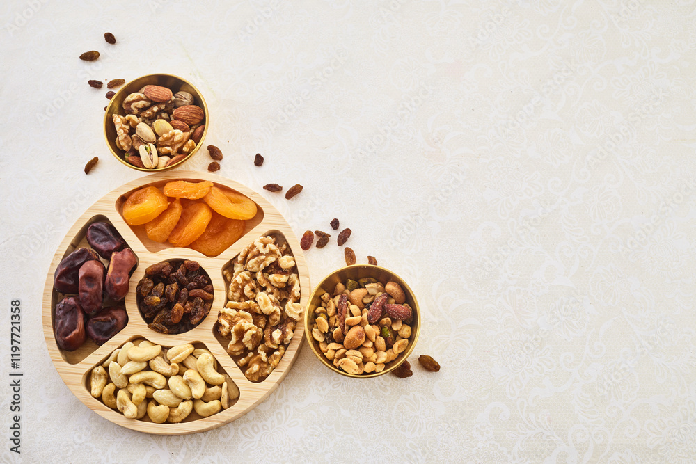 Fototapeta premium Concept of the Jewish holiday Tu Bishvat. Dried Fruits and Nuts Arrangement.