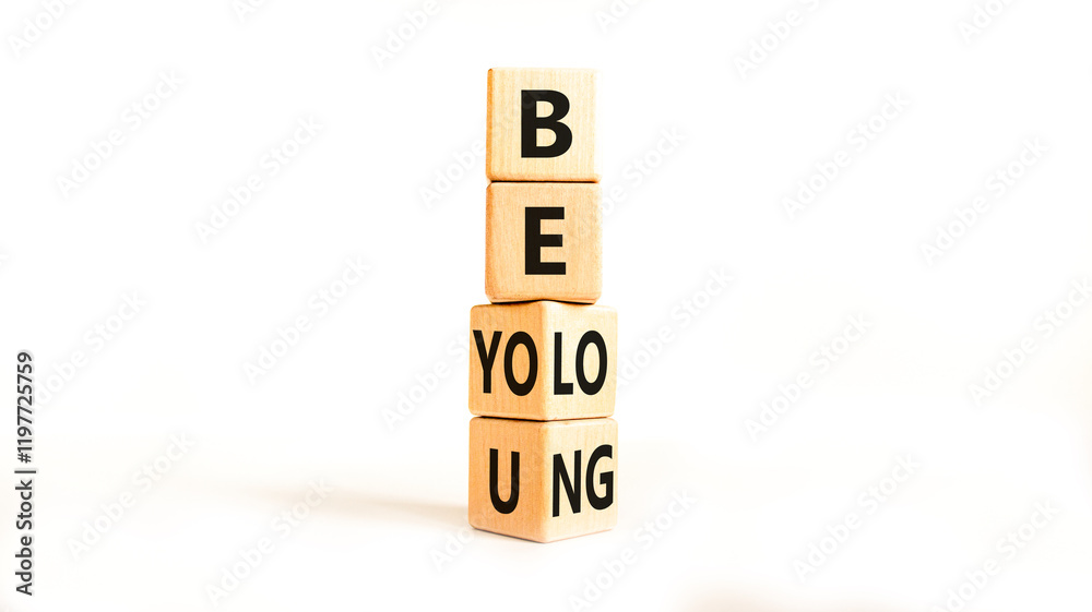 Belonging and belong symbol. Concept words Be you Belong on beautiful wooden block. Beautiful white table white background. Business motivational belonging and belong concept. Copy space. Belonging and belong symbol. Concept words Be you Belong on beautiful wooden block. Beautiful white table white background. Business motivational belonging and belong concept. Copy space.