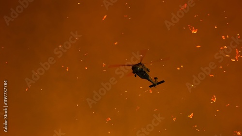 Obraz na płótnie Helicopter battles Los Angeles wildfire amid intense smoke and flames during wildfire season w salonie