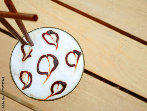 Iced mocha on wooden table photo