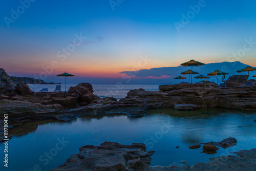Fototapeta Naklejka Na Ścianę i Meble -  Sunrise on the beautiful Nikolas beach on the island of Rhodes in Greece. Seascape