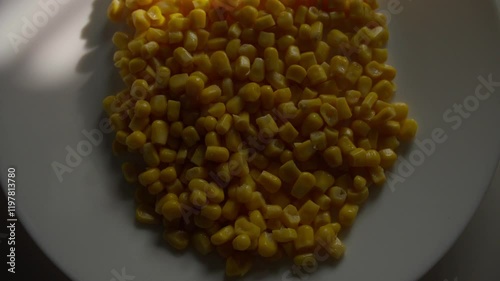 Sweet Corn Kernels on a White Plate photo