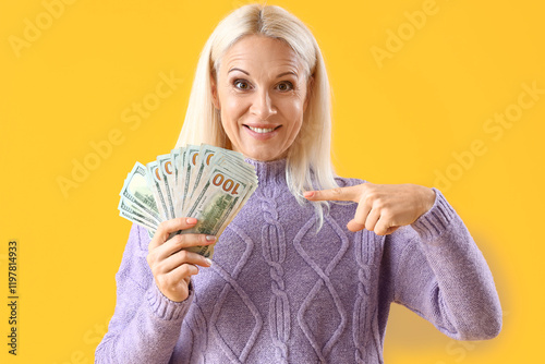Happy mature woman holding ...