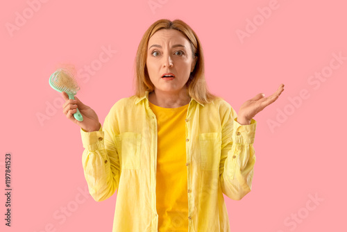 Worried mature woman with h...