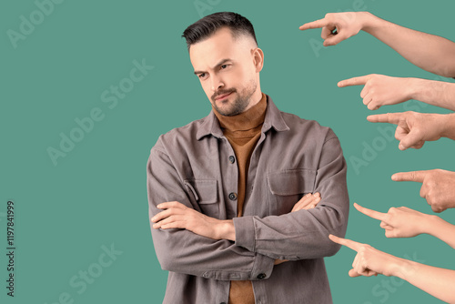 People pointing at young ma...