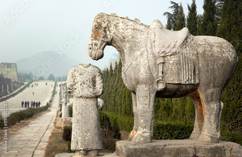 Qianling Mausoleum, Shaanxi, China. Stone horse beside spirit path to tomb of Tang Dynasty emperor Li Zhi and empress Wu Zetian