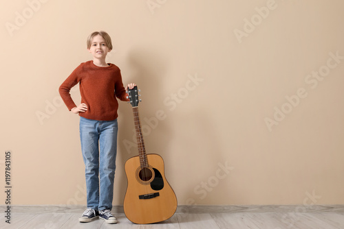 Cute little boy with guitar...