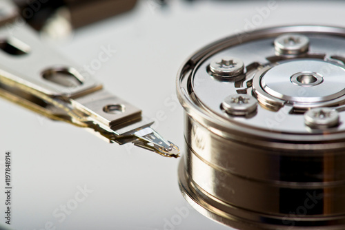 Close-up view of a hard drive read-write arm in action