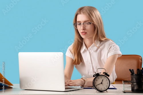 Young businesswoman working...