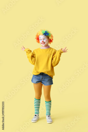 Funny little girl in clown ...