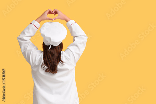 Young female chef making he...
