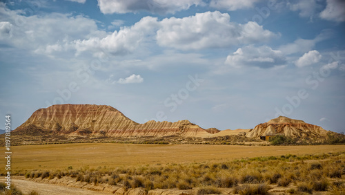 Bardenas Reales Natural Park, an extensive desert region located in the province of Navarra, with imposing canyons, limestone cliffs and rocky outcrops photo