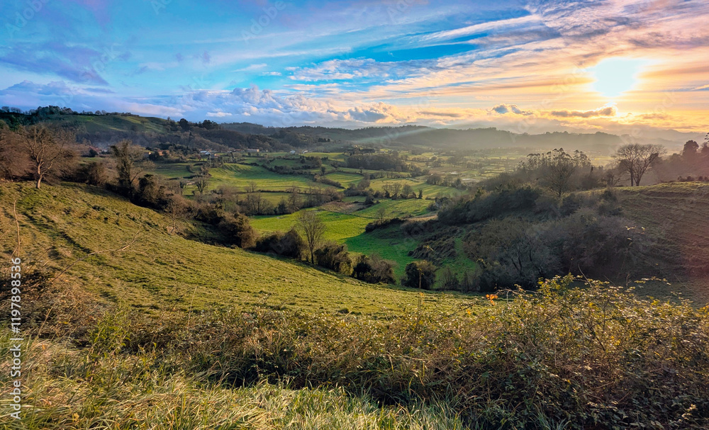 Obraz premium Meadows and woods near Lieres village at dusk, Siero municipality, Asturias, Spain
