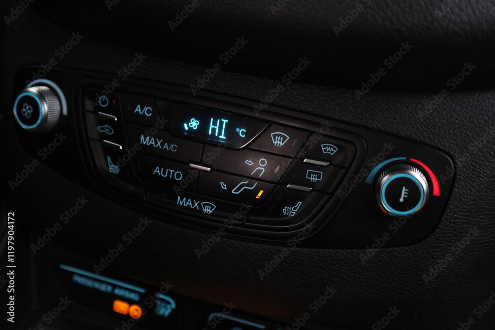 car black interior: dashboard with temperature, adjustment of the blower, air conditioner and other buttons. car black interior: dashboard with temperature, adjustment of the blower, air conditioner and other buttons.
